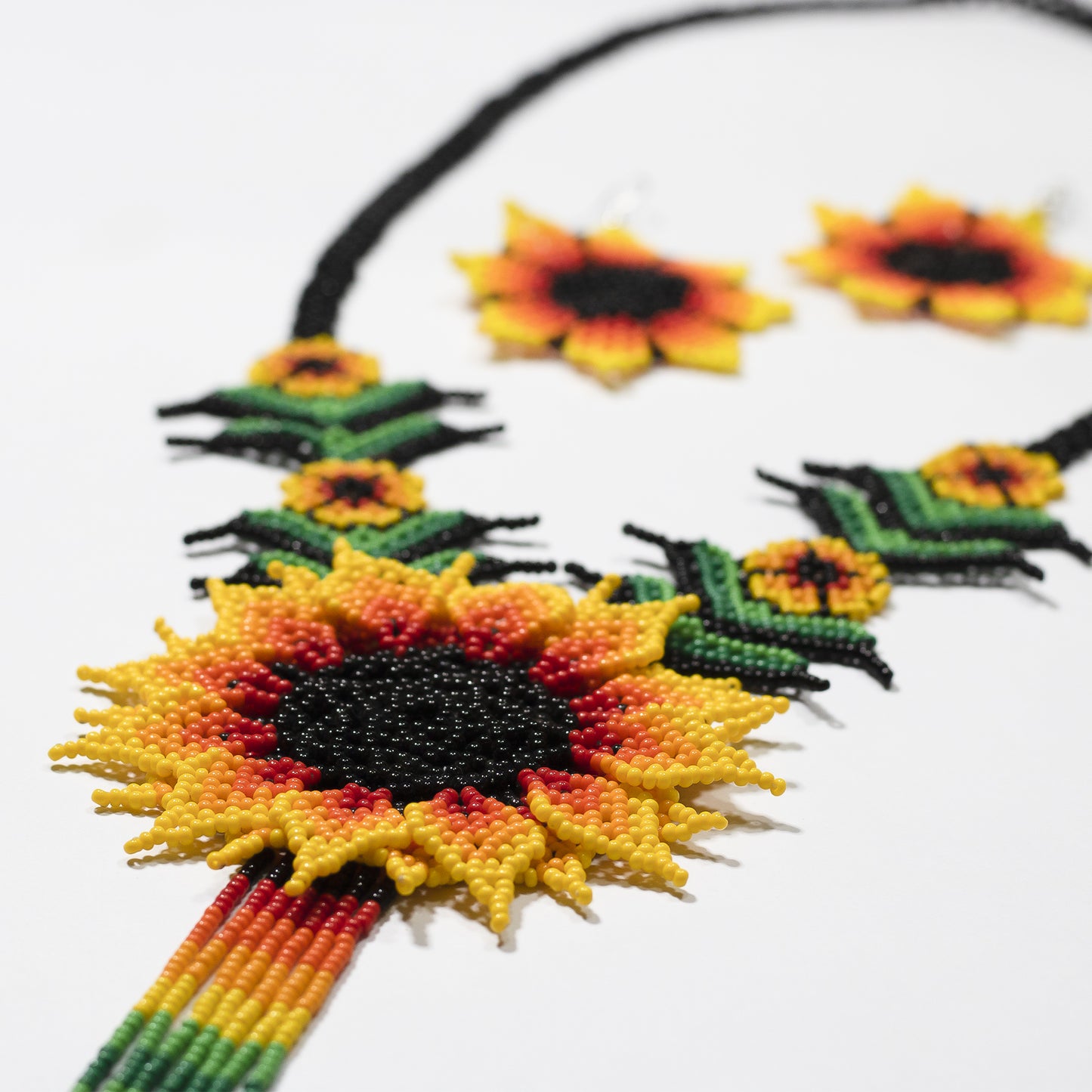 Yellow, black, orange and green sunflower and leaves long necklace & earrings set